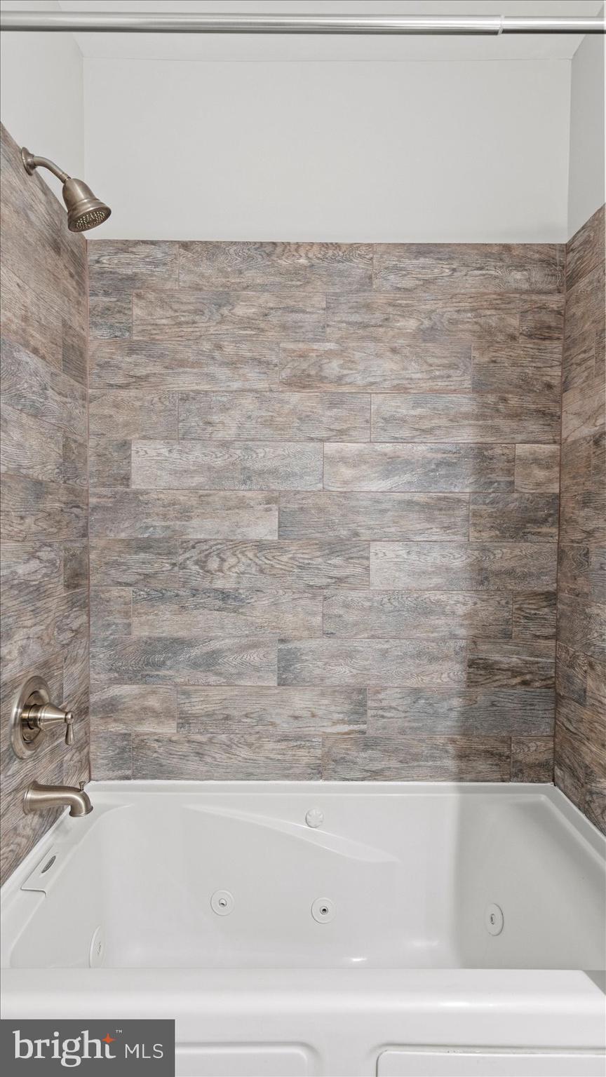 3145 Baybriar Road Dundalk, MD 21222 - Photo 43 of 54 a bathroom with a bathtub