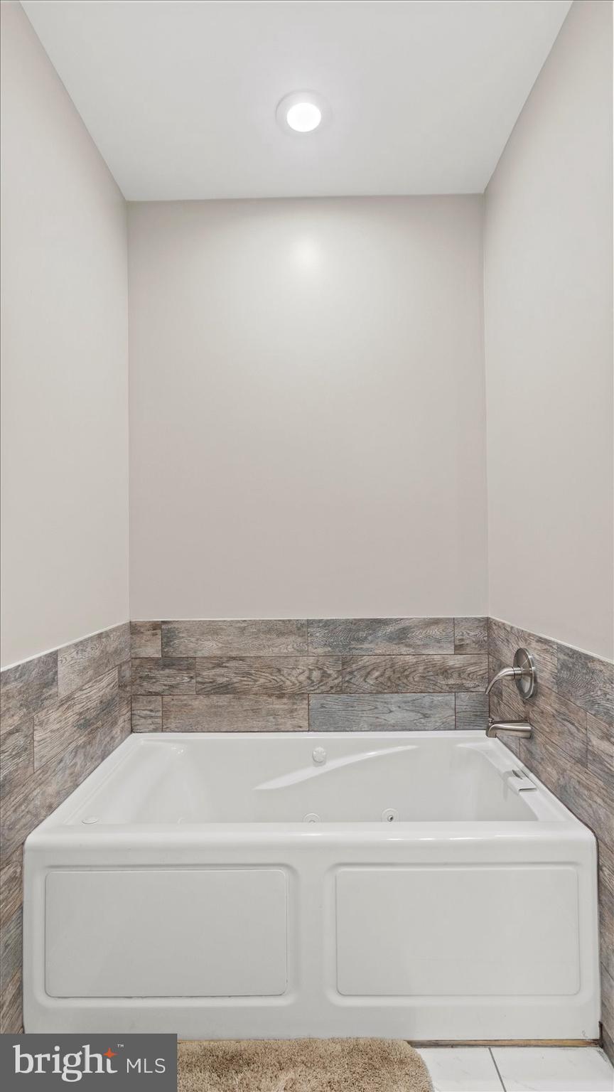 3145 Baybriar Road Dundalk, MD 21222 - Photo 49 of 54 a bathroom with a bathtub