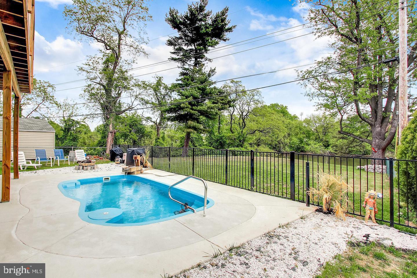 3145 Baybriar Road Dundalk, MD 21222 - Photo 7 of 54 a view of a swimming pool with an outdoor seating