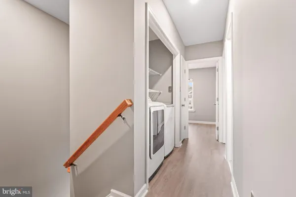 a view of a hallway with the entryway