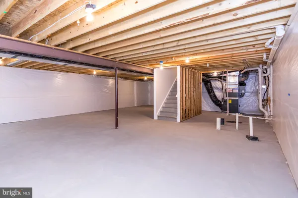 a view of a room with wooden walls