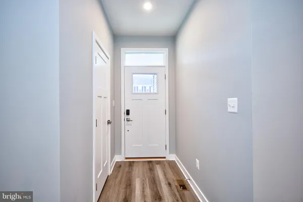 a view of a livingroom with wooden floor