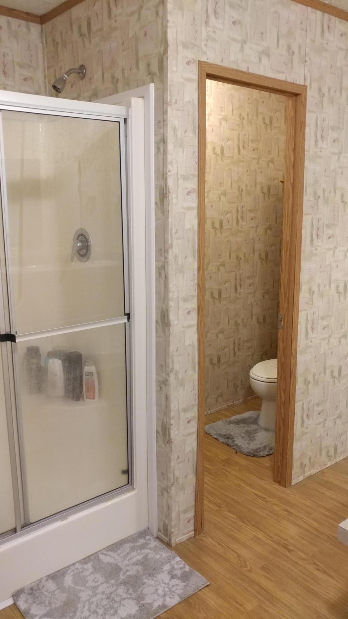 319 Delaware Road DeFuniak Springs, FL 32433 - Photo 12 of 22 a bathroom with a shower