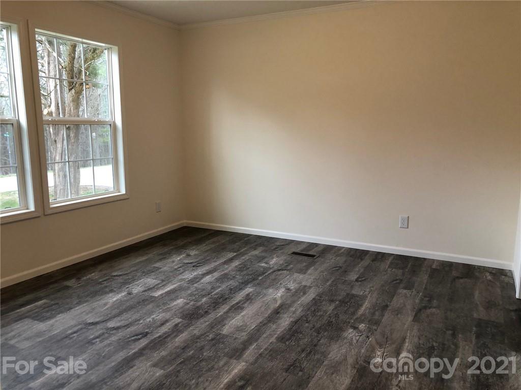 318 Souther Road Fletcher, NC 28732 - Photo 13 of 19 a view of an empty room and window