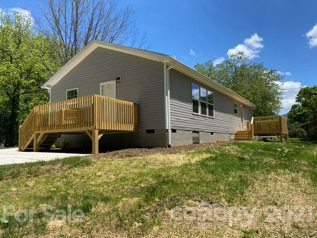 318 Souther Road Fletcher, NC 28732 - Photo 3 of 19 a front view of a house with a yard