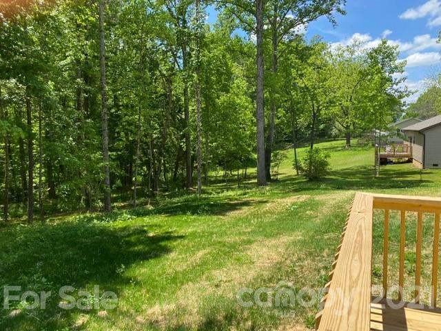318 Souther Road Fletcher, NC 28732 - Photo 5 of 19 a view of backyard with swimming pool