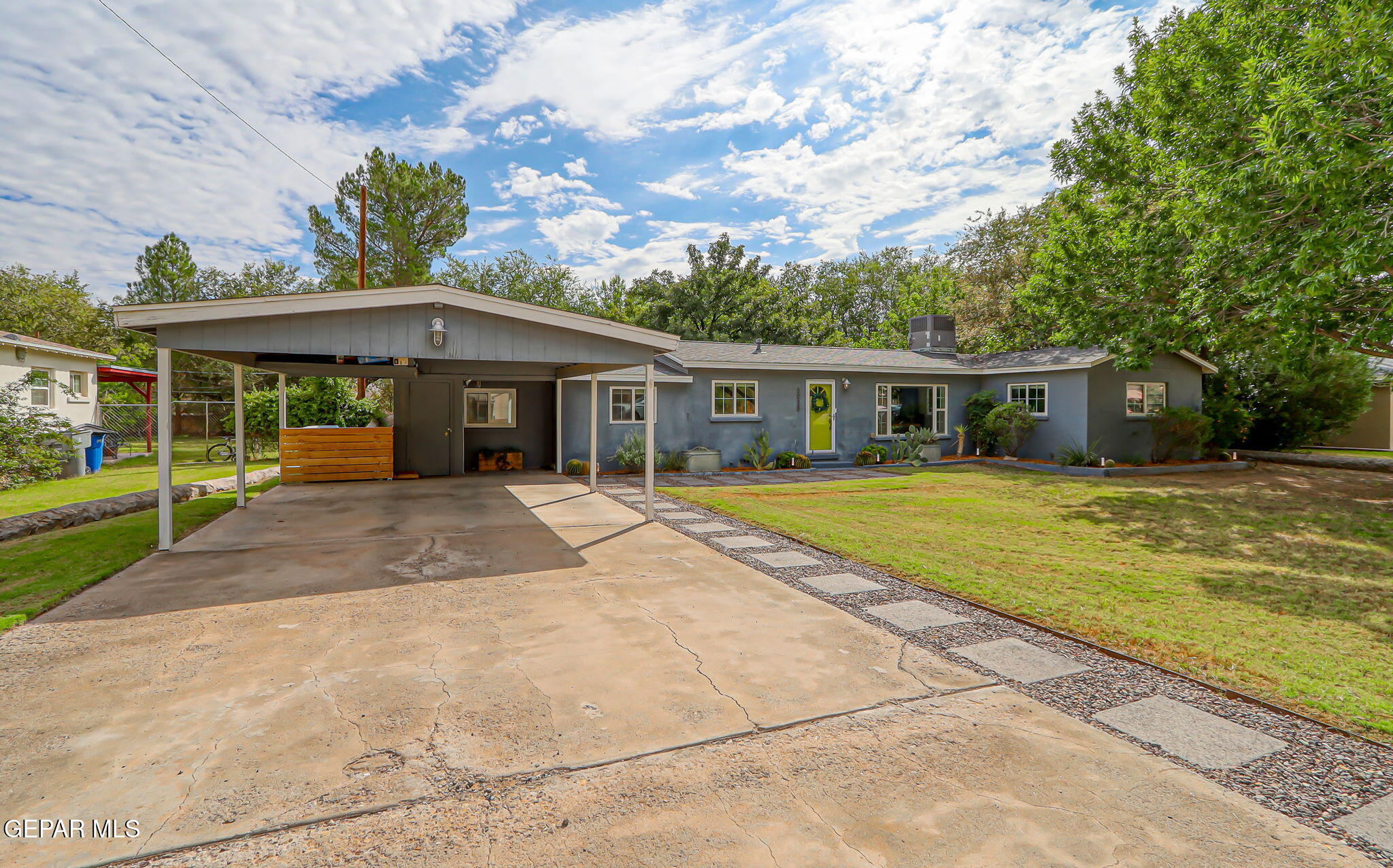 a view of house with a garden