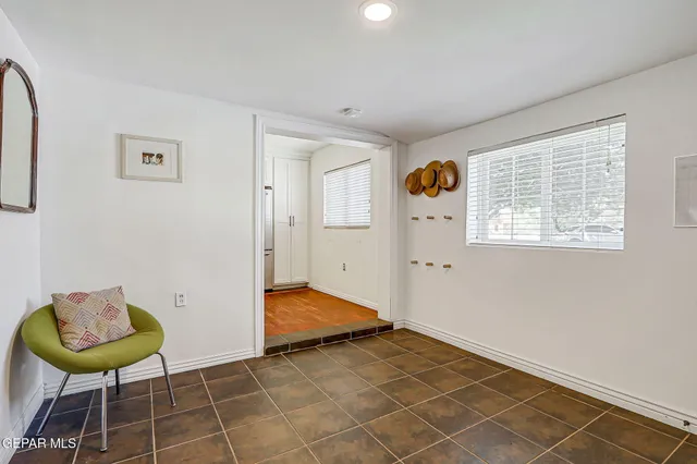 a view of a hallway with washer and dryer