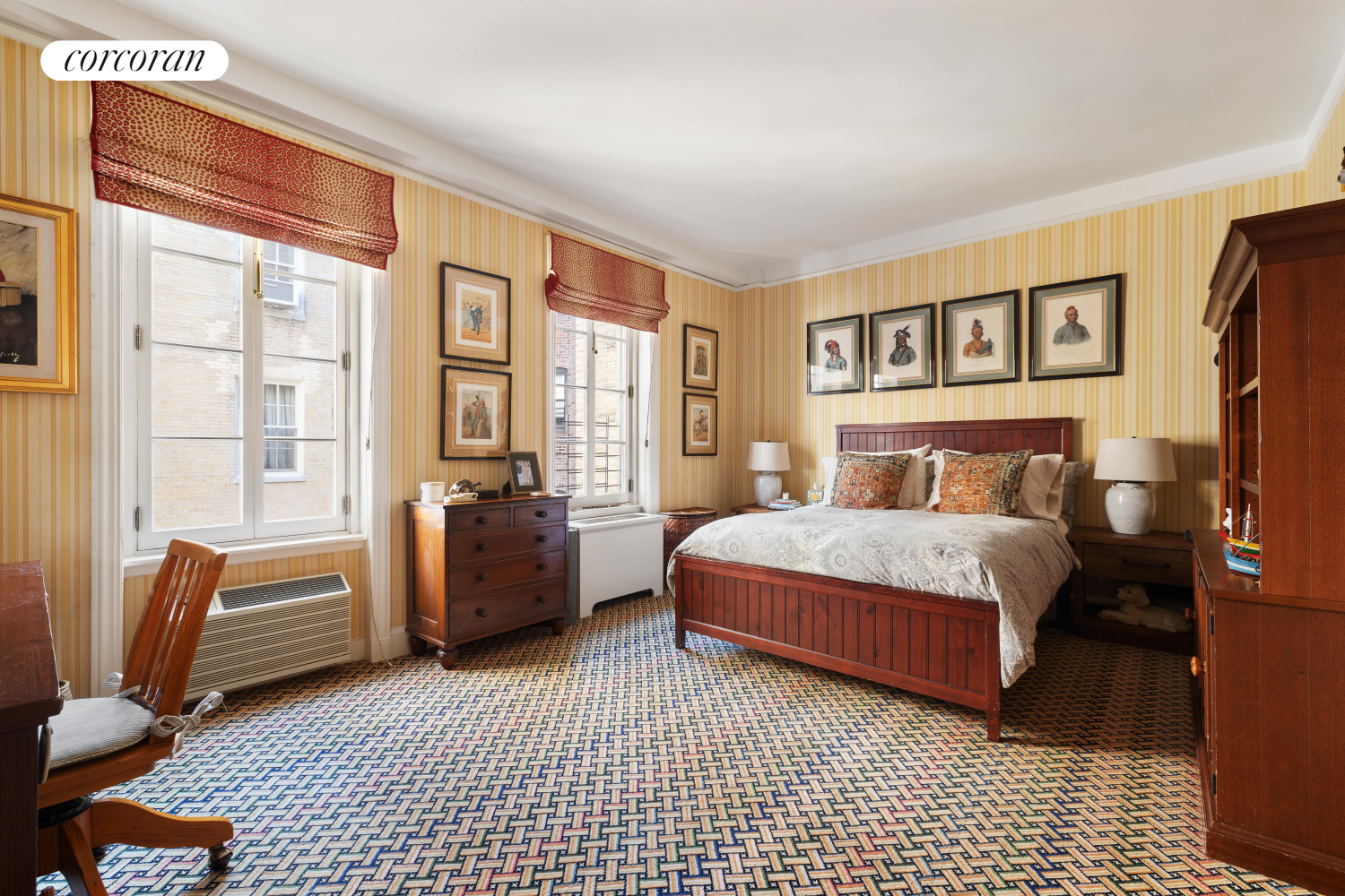 137 East 66th Street, Unit 8AB Manhattan, NY 10065 - Photo 14 of 18 a bedroom with a bed and a couch