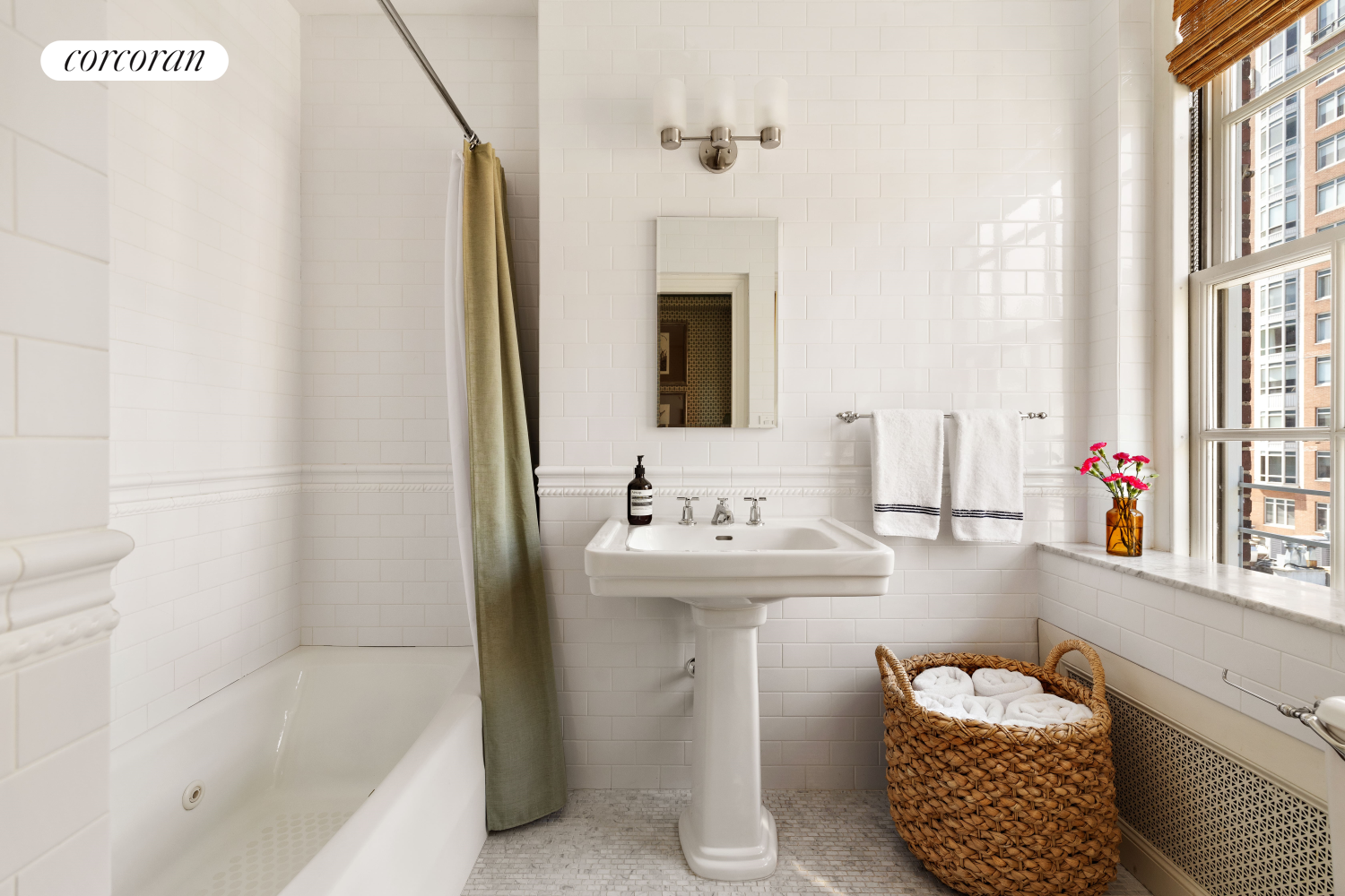 137 East 66th Street, Unit 8AB Manhattan, NY 10065 - Photo 15 of 18 a bathroom with a sink toilet and shower