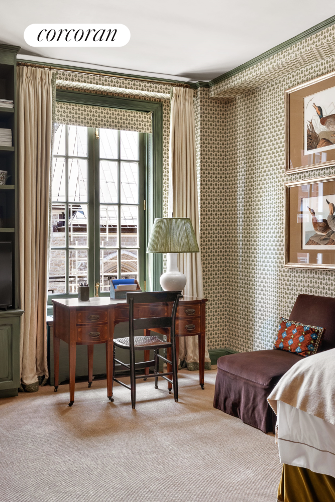 137 East 66th Street, Unit 8AB Manhattan, NY 10065 - Photo 16 of 18 a living room with a bed furniture and a window