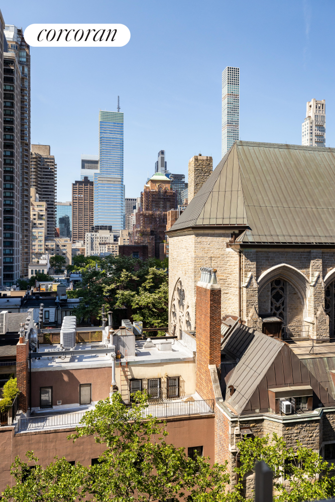 137 East 66th Street, Unit 8AB Manhattan, NY 10065 - Photo 5 of 18 a view of multiple houses with a street