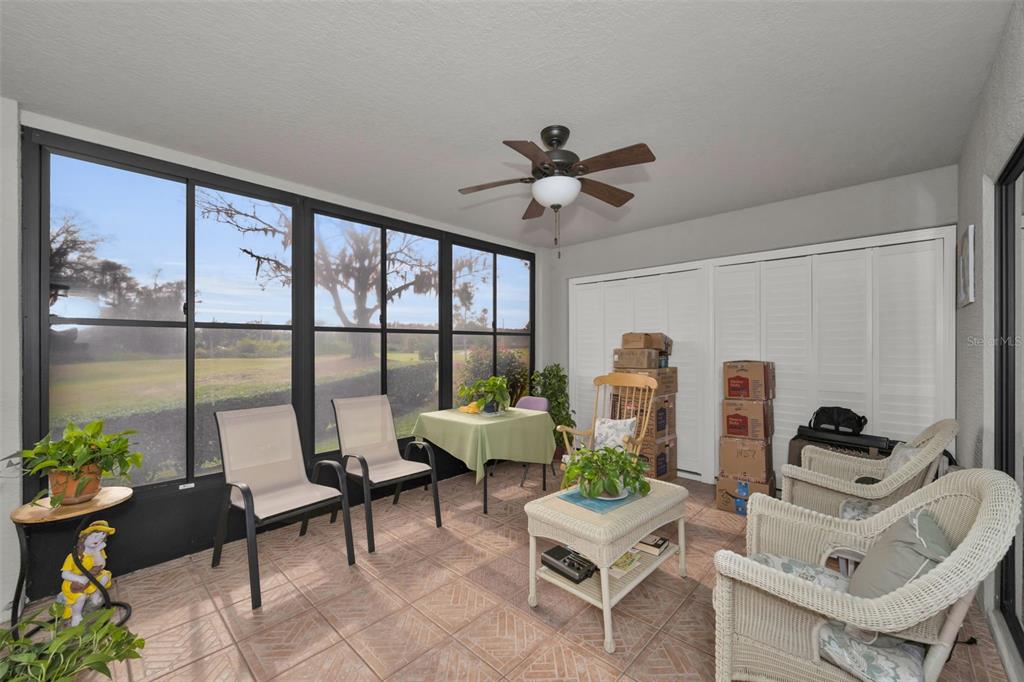 9630 Green Needle Drive New Port Richey, FL 34655 - Photo 35 of 83 a living room with furniture and a large window