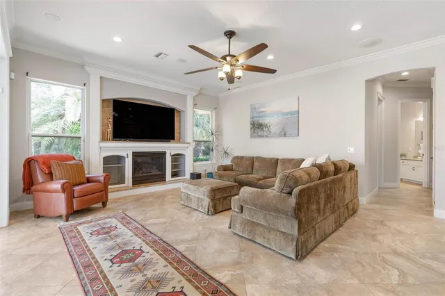 a living room with furniture a fireplace