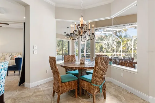 a kitchen with stainless steel appliances granite countertop a sink and dishwasher a stove top oven with wooden floor