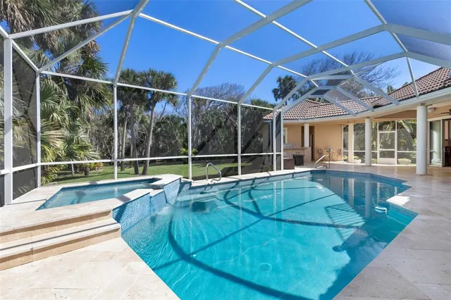 a view of a house with a swimming pool