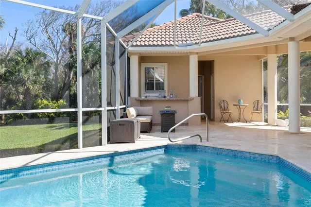 a bathroom with a granite countertop sink a toilet a mirror and shower