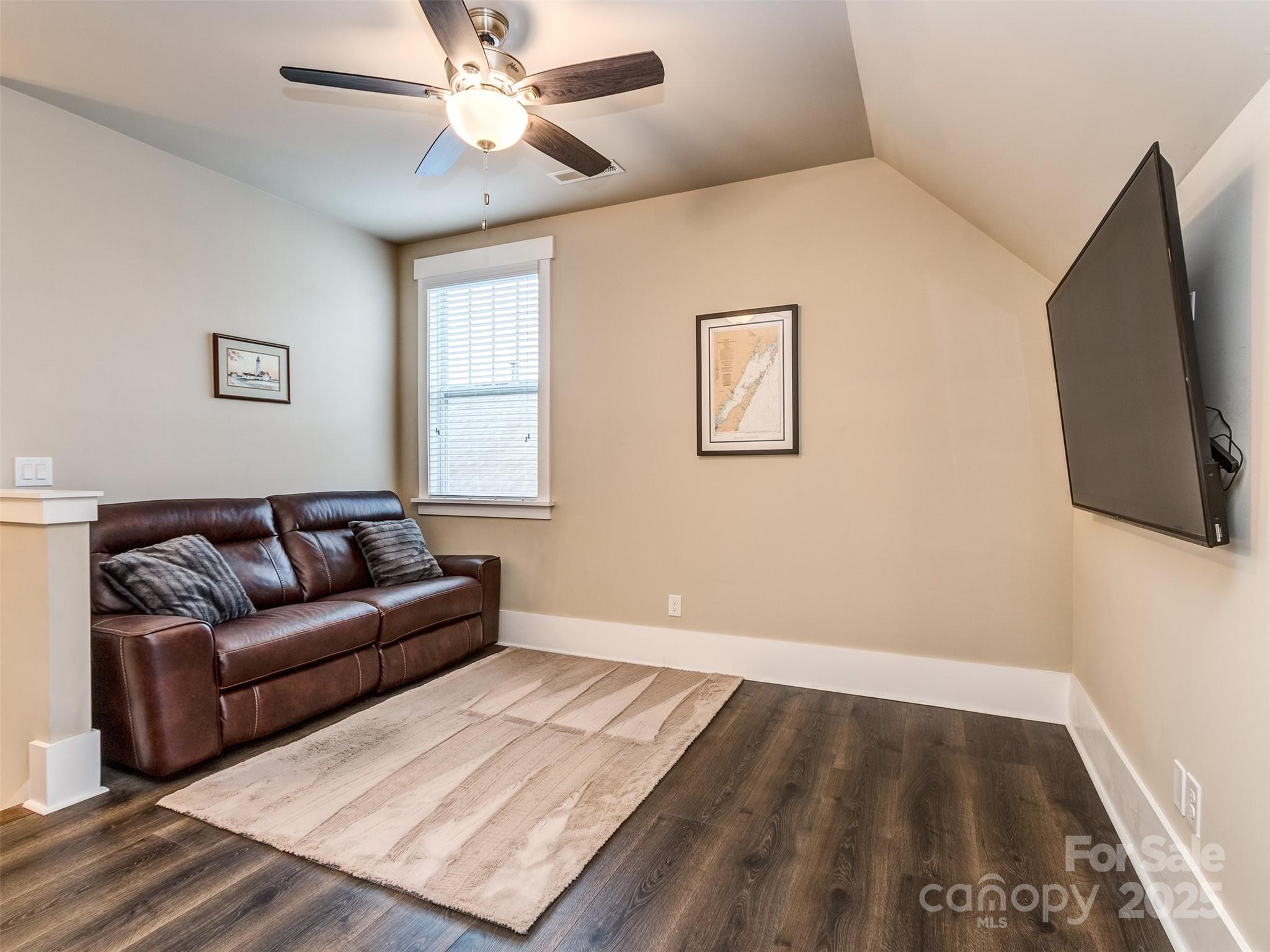 1055 Ridge Runner Road Rock Hill, SC 29730 - Photo 21 of 43 a living room with furniture and a flat screen tv