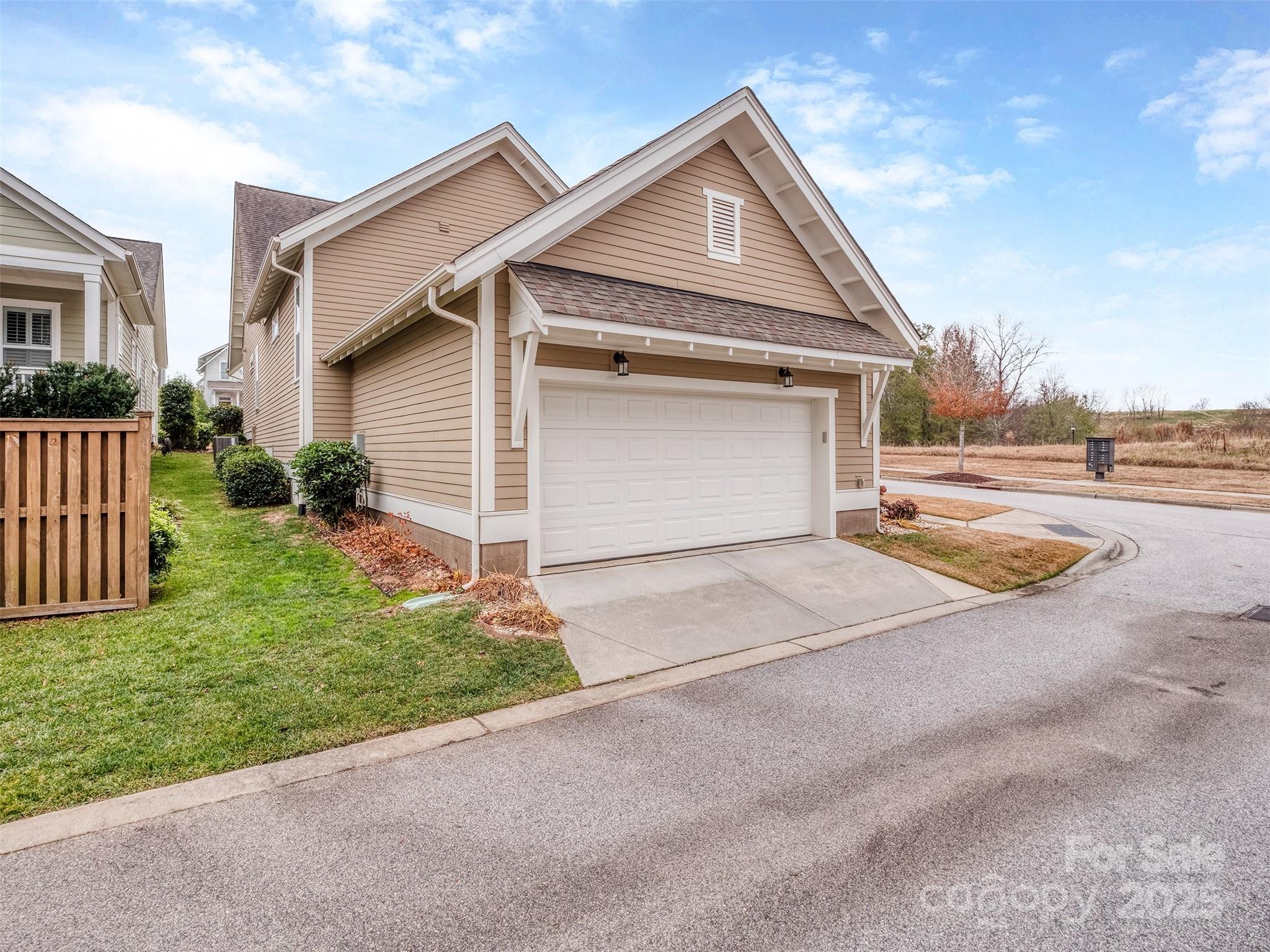 1055 Ridge Runner Road Rock Hill, SC 29730 - Photo 29 of 43 a front view of a house with a yard and garage