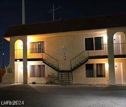 4150 Solteros Street, Unit 1 Las Vegas, NV 89103 - Photo 2 of 25 Property at twilight featuring stairs