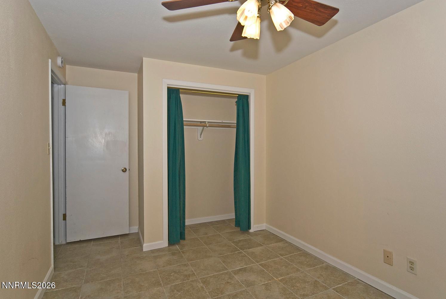 3185 Corey Drive Reno, NV 89509 - Photo 30 of 46 055-039-Downstairs Bedroom 3-1494x1000