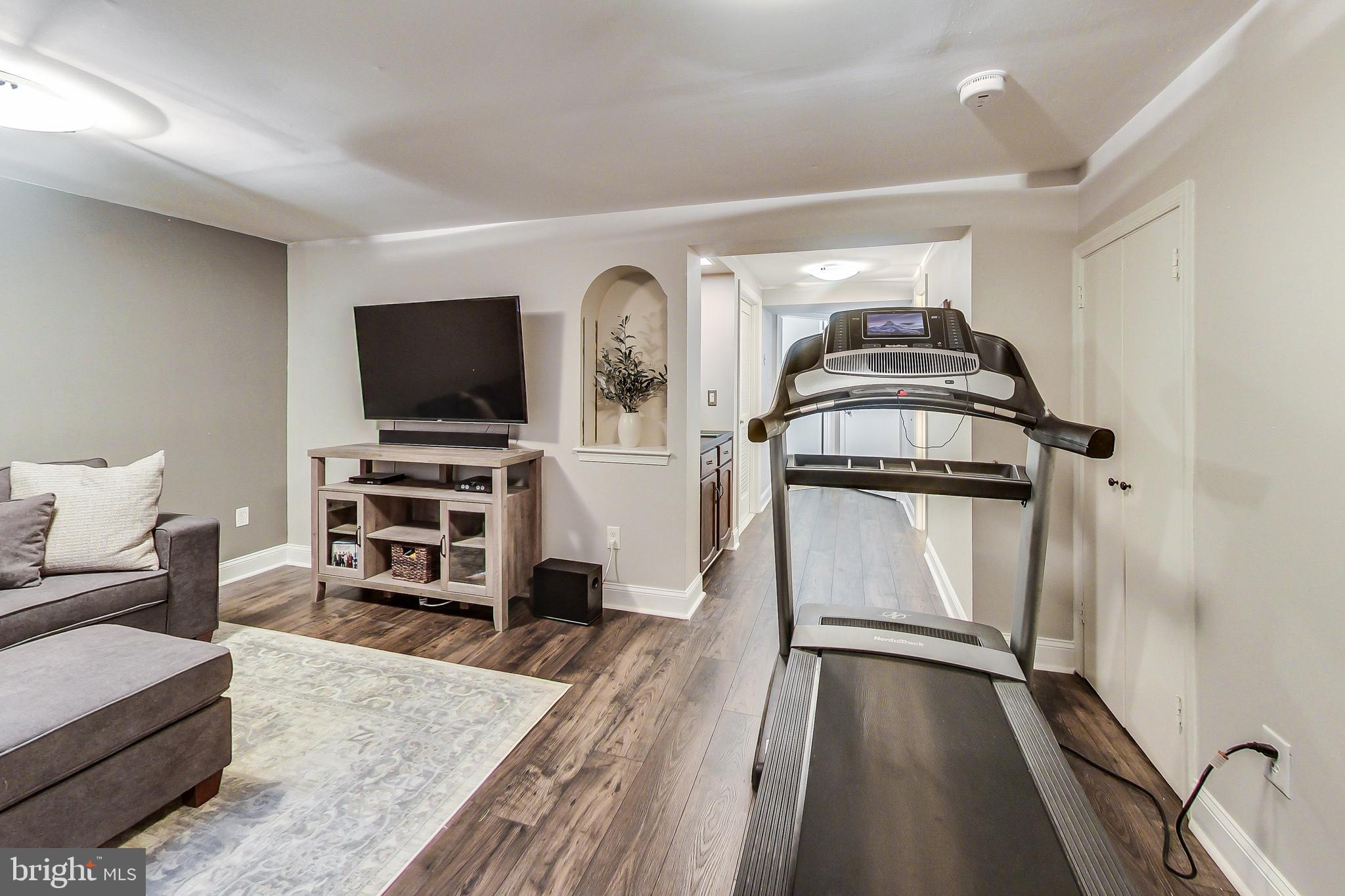 2420 Ansdel Court Reston, VA 20191 - Photo 20 of 28 Basement with wet bar and new flooring