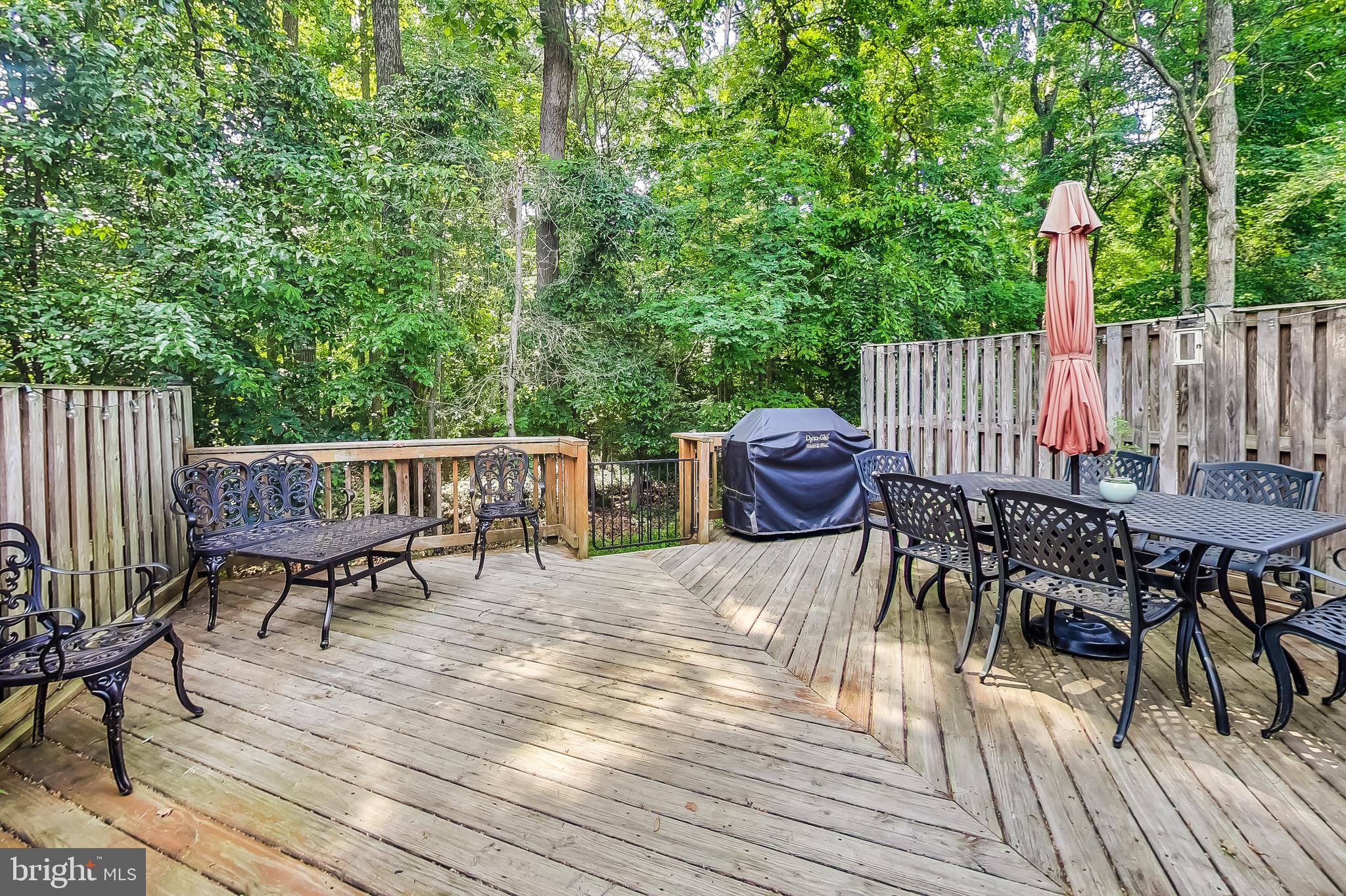 2420 Ansdel Court Reston, VA 20191 - Photo 25 of 28 Fully decked backyard backing to trees for privacy