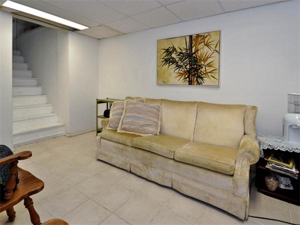 14 Beach Street, Unit 14 Newton, MA 02458 - Photo 13 of 15 a living room with furniture and a couch