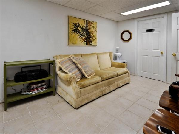 14 Beach Street, Unit 14 Newton, MA 02458 - Photo 14 of 15 a living room with furniture and a flat screen tv