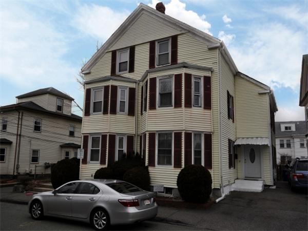 14 Beach Street, Unit 14 Newton, MA 02458 - Photo 15 of 15 a car parked in front of a house