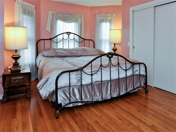 14 Beach Street, Unit 14 Newton, MA 02458 - Photo 10 of 15 a bedroom with a bed table and a window