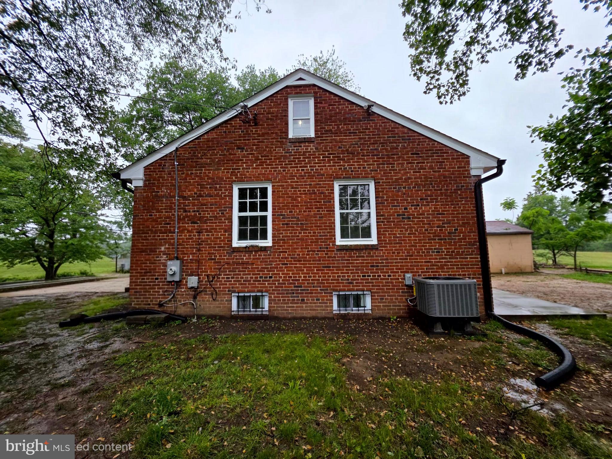 2206 Brinkley Road Fort Washington, MD 20744 - Photo 28 of 78 a front view of a house with garden