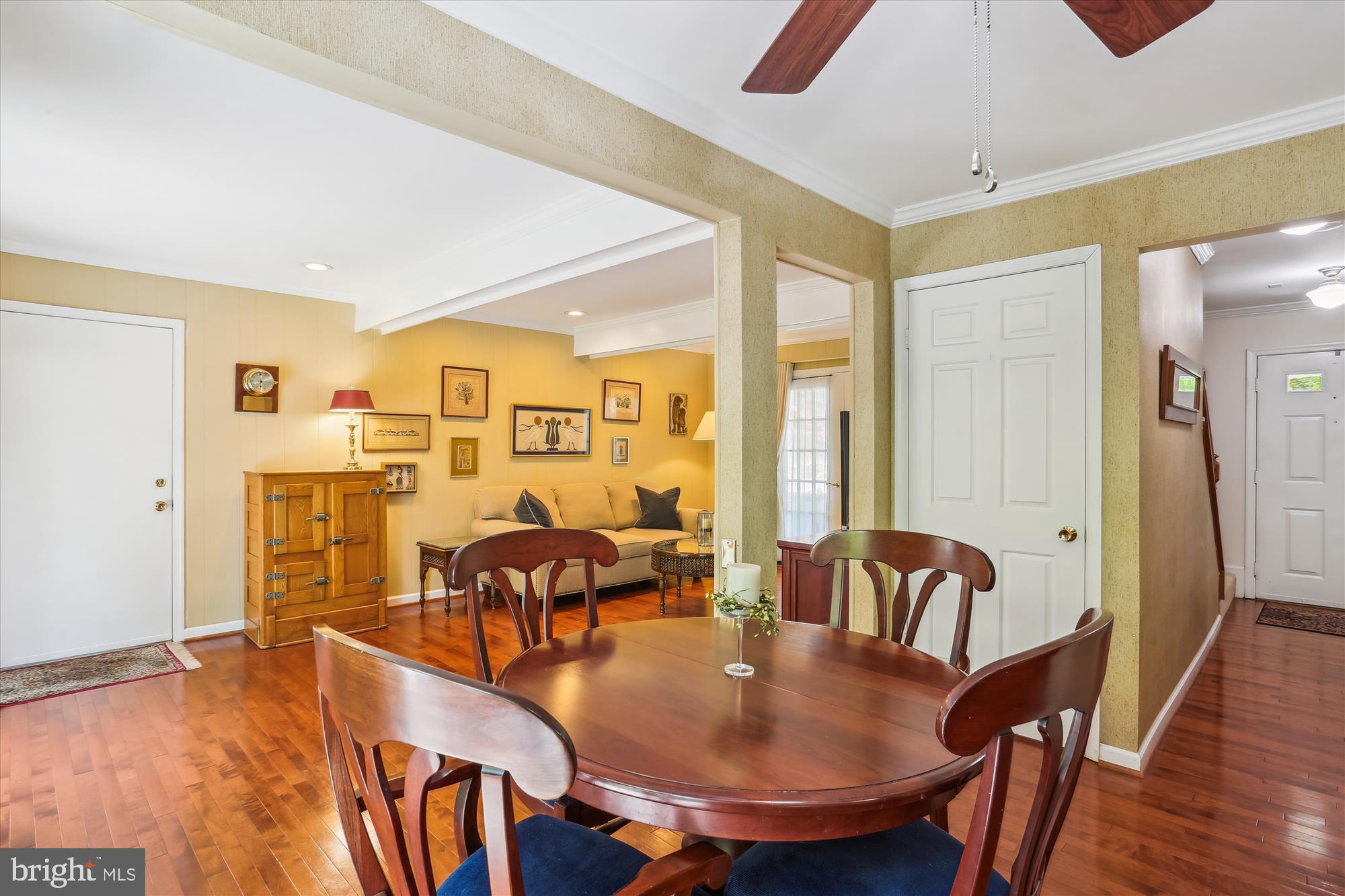 207 Rabbitt Road Gaithersburg, MD 20878 - Photo 13 of 38 a dining room with furniture and wooden floor