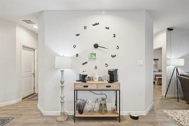 a kitchen with stainless steel appliances cabinets and a refrigerator