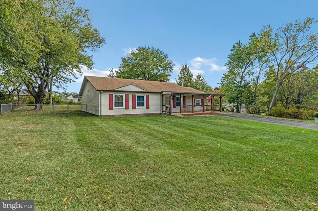 a house view with a garden space