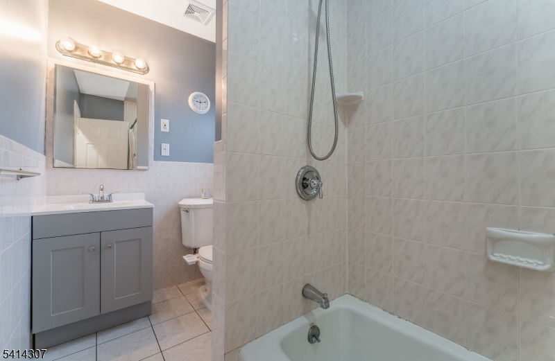409 Boonton Avenue Boonton, NJ 07005 - Photo 20 of 43 a bathroom with a sink a toilet and shower