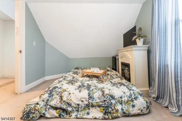 a room with furniture and a wooden floor
