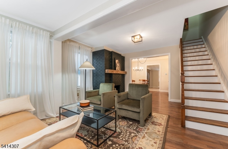 409 Boonton Avenue Boonton, NJ 07005 - Photo 28 of 43 a living room with furniture and a wooden floor