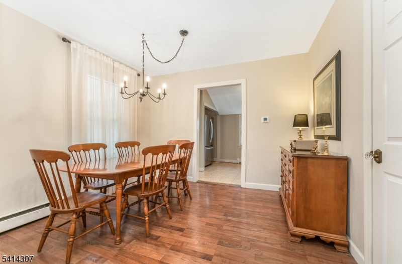 409 Boonton Avenue Boonton, NJ 07005 - Photo 32 of 43 a view of a dining room with furniture and wooden floor