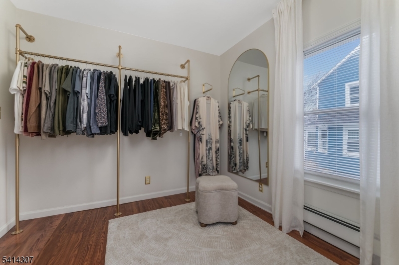 409 Boonton Avenue Boonton, NJ 07005 - Photo 39 of 43 a view of walk in closet with clothes and shoes