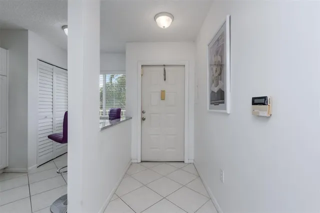a kitchen with stainless steel appliances a refrigerator and a sink