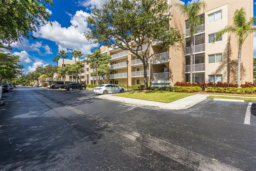 9537 Weldon Circle, Unit 404 Fort Lauderdale, FL 33321 - Photo 4 of 39 a view of street with apartments