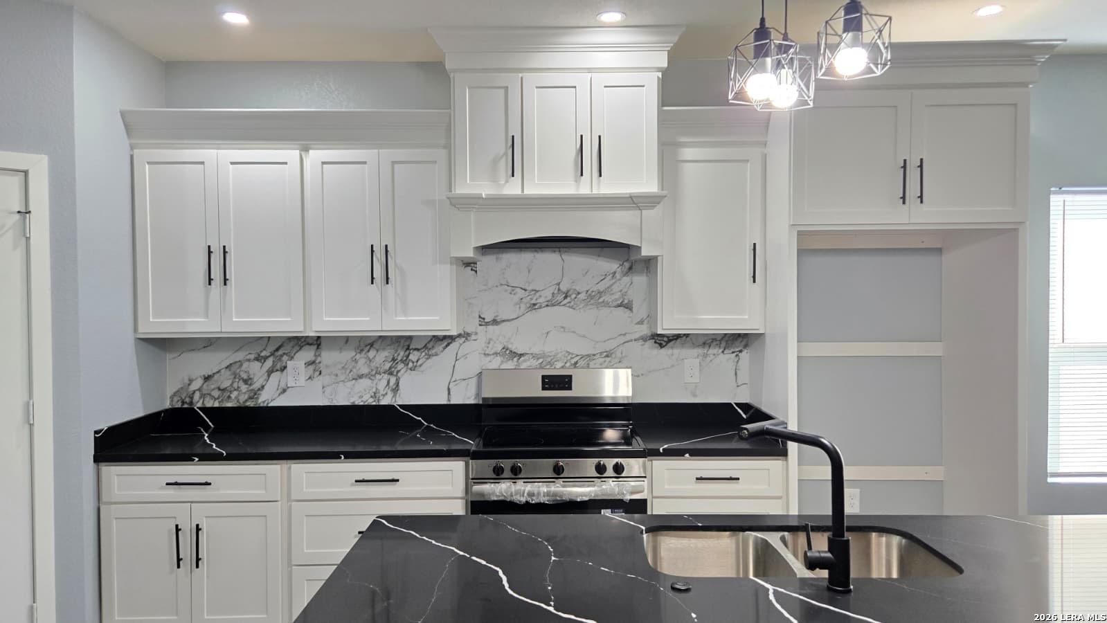 802 Cr 520 D'Hanis, TX 78850 - Photo 18 of 33 a kitchen with a stove and cabinets