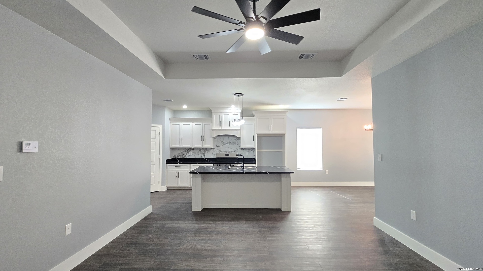 802 Cr 520 D'Hanis, TX 78850 - Photo 19 of 33 a kitchen with stainless steel appliances granite countertop a stove and a refrigerator