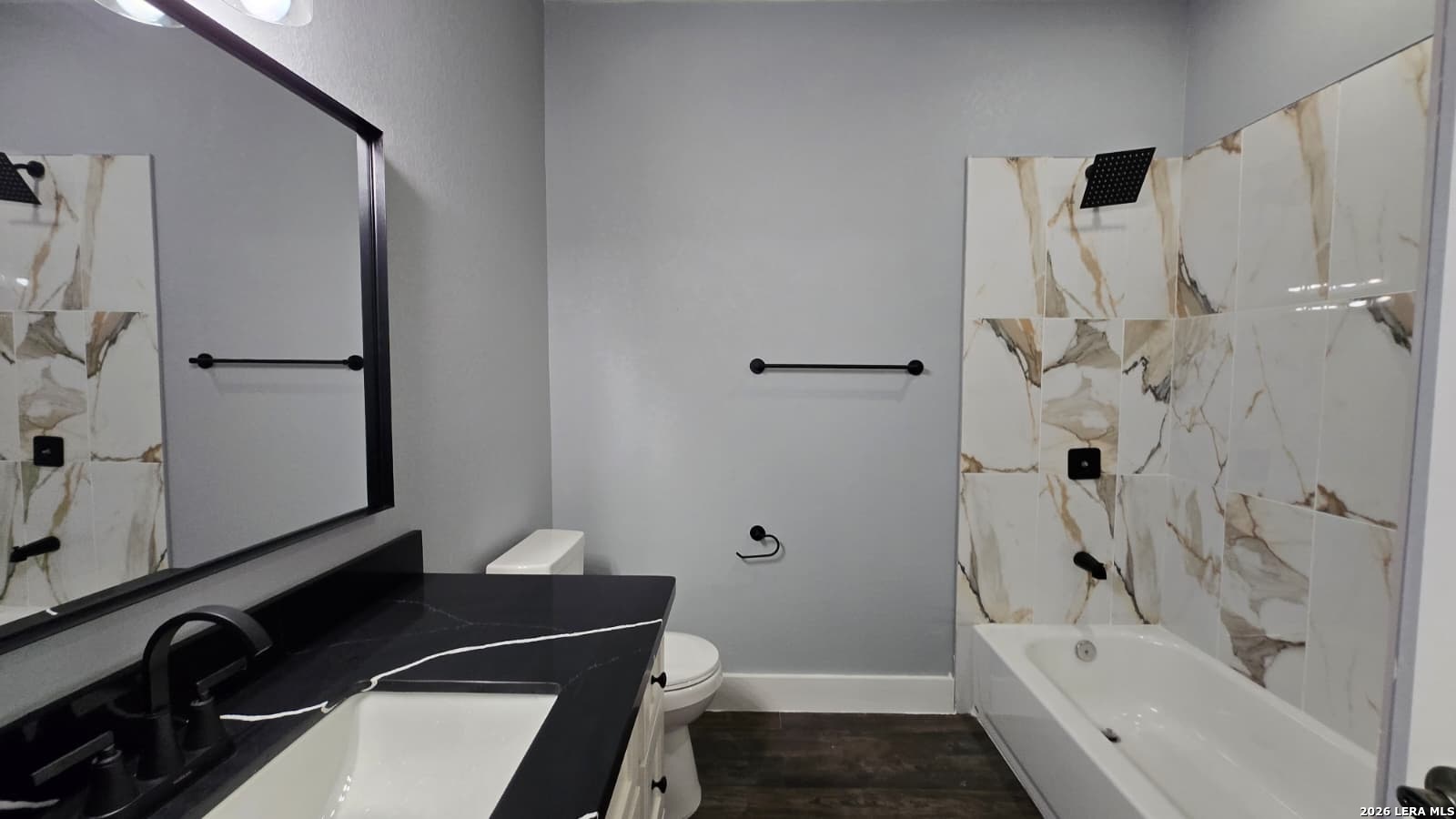 802 Cr 520 D'Hanis, TX 78850 - Photo 25 of 33 a bathroom with a bathtub and a shower