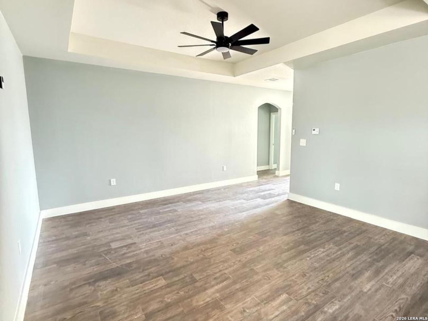 802 Cr 520 D'Hanis, TX 78850 - Photo 9 of 33 wooden floor in an empty room