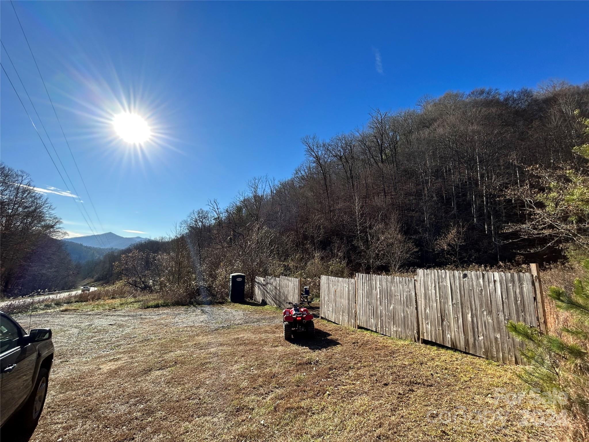 1380 Little Pine Road Marshall, NC 28753 - Photo 7 of 12 a view of a yard with a snow on the road