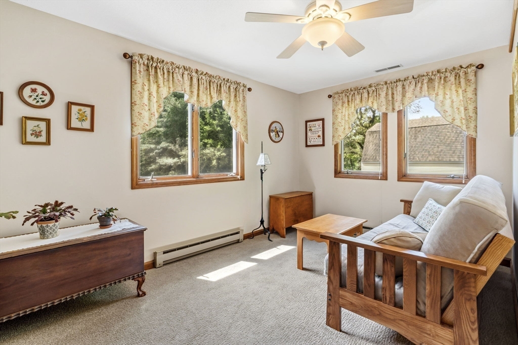 788 Burts Pit Road Northampton, MA 01062 - Photo 24 of 42 a bedroom with furniture and windows