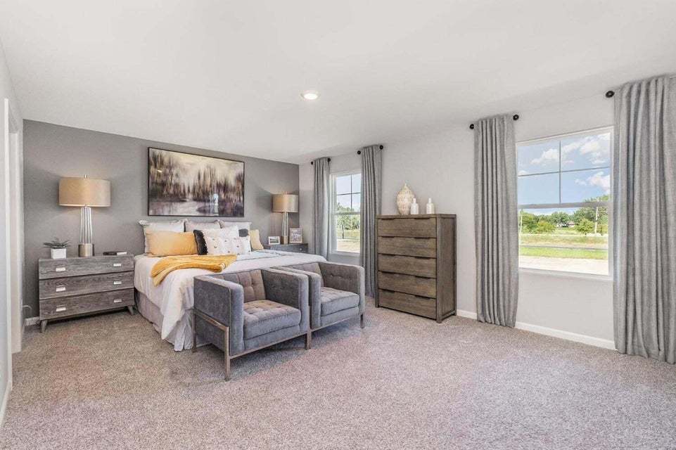 615 Ensign Place Hebron, IN 46341 - Photo 19 of 29 a bed room with a bed and a window