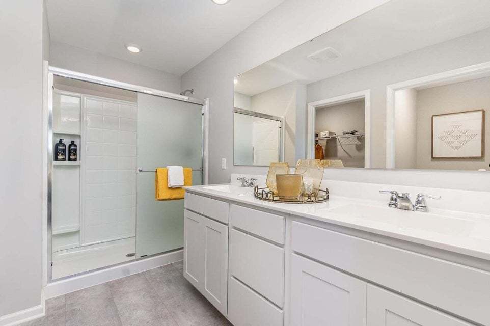 615 Ensign Place Hebron, IN 46341 - Photo 21 of 29 a bathroom with a sink and a mirror